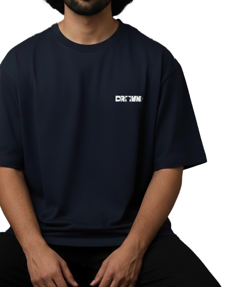 Person wearing a black t-shirt with a logo of drivnwear