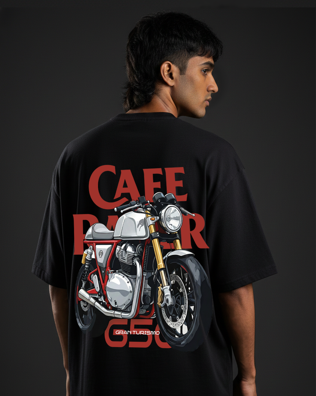 Person wearing a black t-shirt with a graphic of a motorcycle and 'Cafe Racer' text on the back.