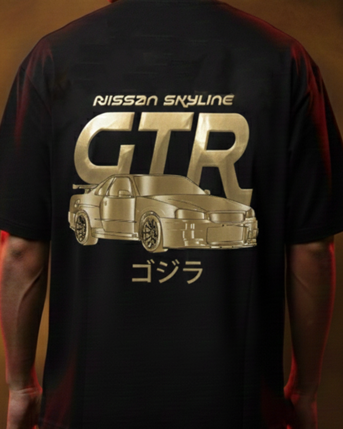 Person wearing a black t-shirt with 'Nissan Skyline GTR' design on the back against a brown background