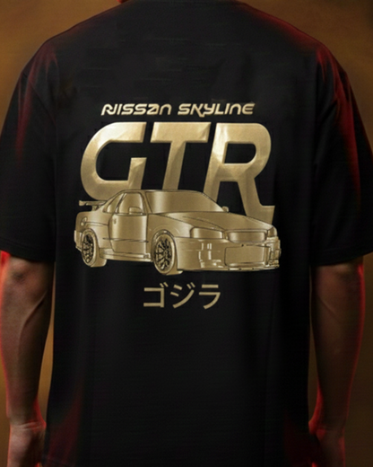 Person wearing a black t-shirt with 'Nissan Skyline GTR' design on the back against a brown background