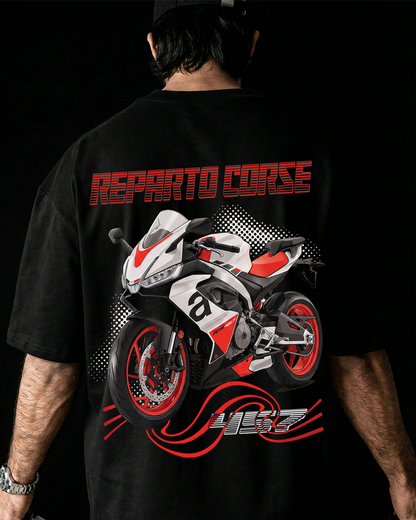 Person wearing a black t-shirt with a motorcycle graphic and 'Reparto corse' text on the back.