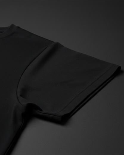 Black t-shirt on a dark gray background